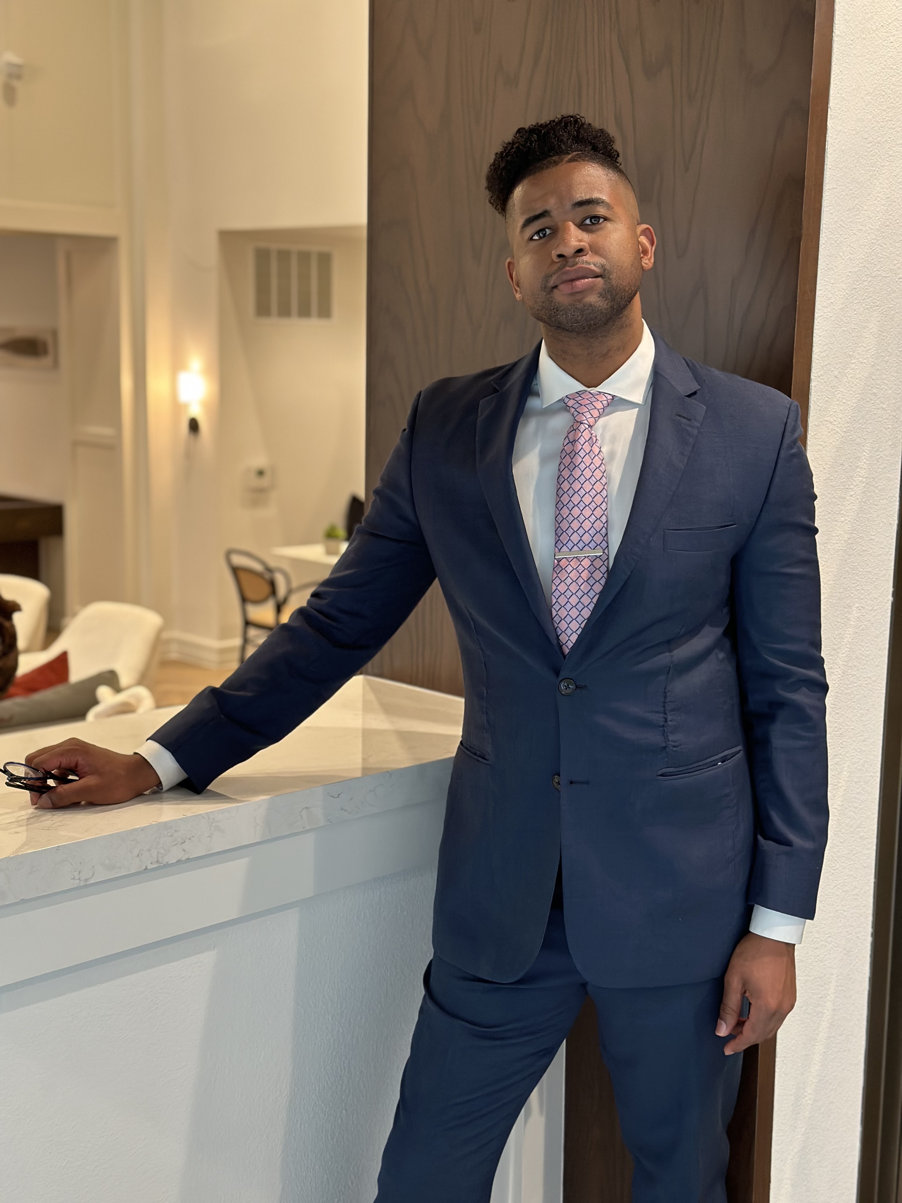 Joseph Robinson in professional attire.